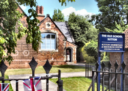 Through the gate, up the path, and in the blue door, for help with searching your family history